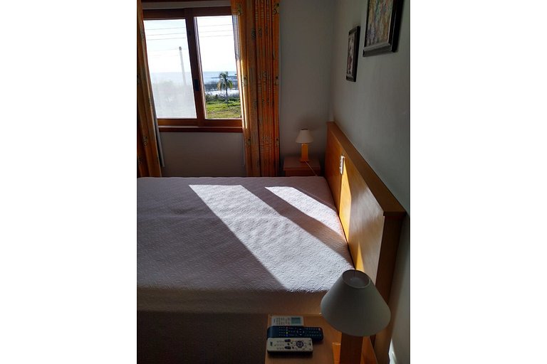 Quarto na praia! Comodidade de um quarto com ar condicionado